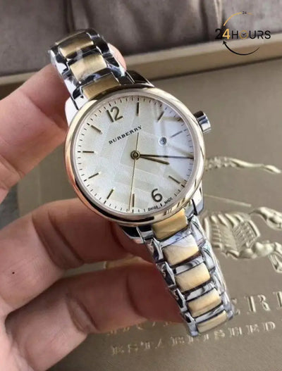 Montre Burberry Ladies Watch Swiss Classic Two Tone
Pour Femme, BU10118