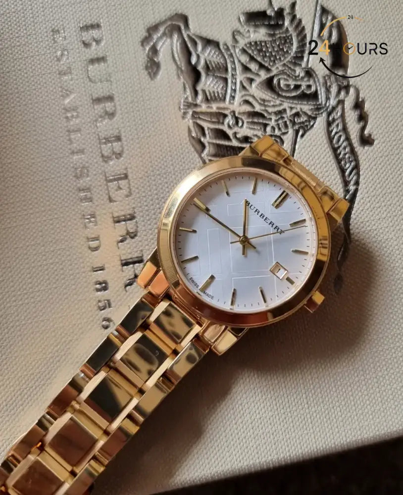 Montre Burberry The City Heritage Swiss Classic
Pour Femme, BU9103