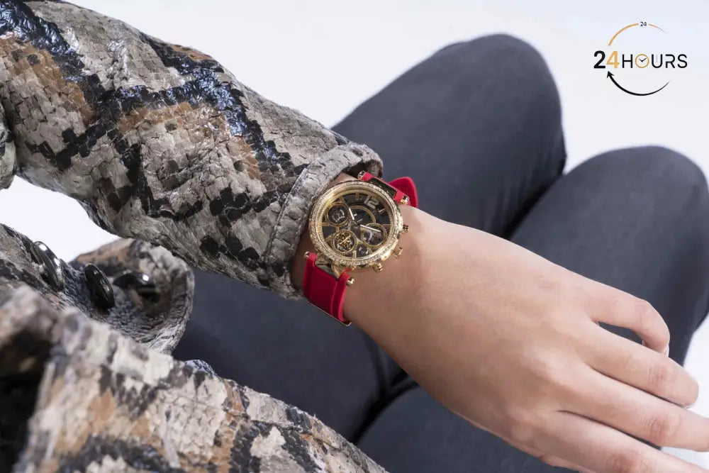 Montre multifonctions Guess Solstice à cadran rond doré pour femme
